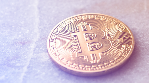 coin with bitcoin engraving